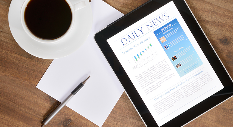 Daily News On Ipad with Coffee and Notepad